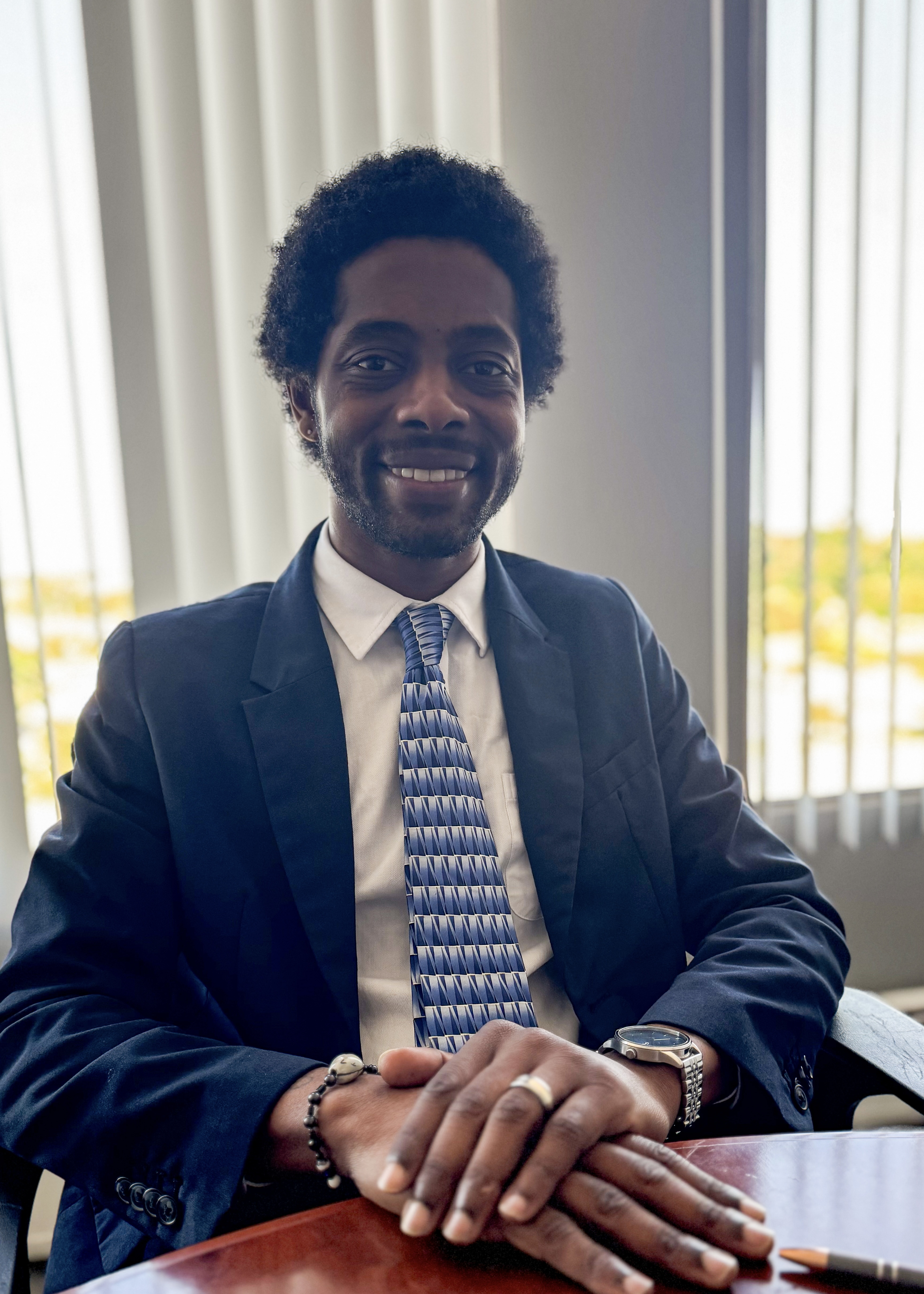 Capacity Expansion professional seated confidently at an office desk